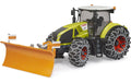 Claas Axion mit Schneeketten und Räumschild